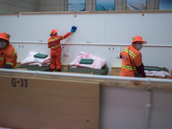 People Cleaning a Room